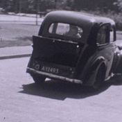 Kenteken: A 12493; Standard Flying Nine, foto: Groningen, Prinsesseweg, still uit de film "Vlieland, 1954", coll. GrA (2209-AV18816)