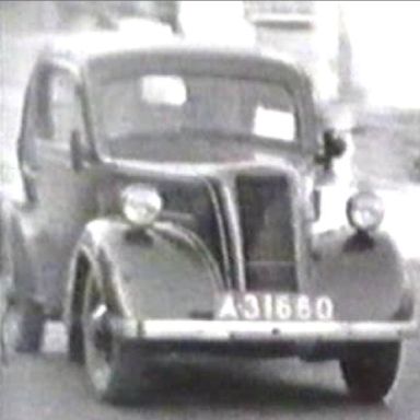 Kenteken: A 31660; Ford Anglia, Winkelweek van 5 – 13 oktober 1951 te Winschoten, foto: K. Roukes-Feiken